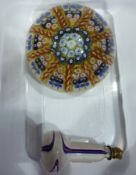 Millefiori paperweight and a Murano style glass scent bottle, the stopper in the form of a small