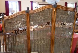 A threefold cane screen with woven panels, height 178cms