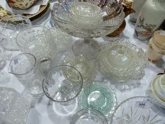 Large quantity of pressed glass, including pin dishes, tazza, butter dish, fruit bowls etc., and
