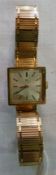 Lady's 9ct gold Tissot wrist watch having baton numerals, with 9ct gold flexible reeded link