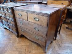 Nineteenth century mahogany chest of two short and three long graduated drawers on splayed bracket