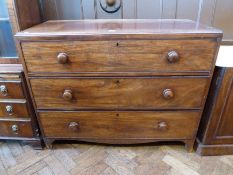 Mahogany chest of three long drawers, circular turned wood handles (af), 110 cm wide