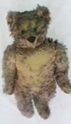 Brown Steiff bear with black button eye, having claws to one paw, (worn), 46 cm high