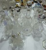 Various cut and pressed glass decanters and a cut glass cruet set (12)