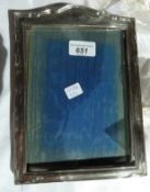 Silver rectangular photograph frame with a trussle support, Birmingham 1926, 24 x 17cms