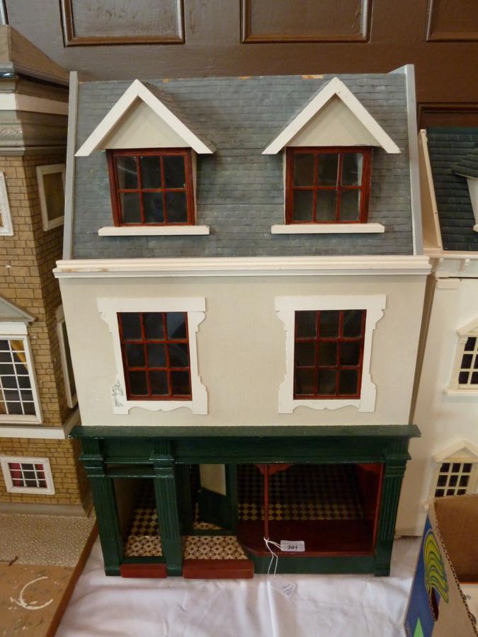Dolls house in the form of a Public House, with hinged front