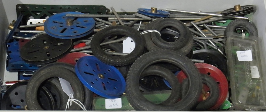 Quantity of Meccano  to include:- wheels, tyres, metal rods etc