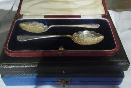 A pair of silver christening presentation spoons, Sheffield 1909, cased, a set of six silver handled