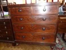A Victorian mahogany chest of two short and three long graduated drawers on bun feet, width 112cms