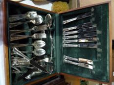 A six piece silver plate canteen of cutlery comprising dinner knives, dessert knives, dinner