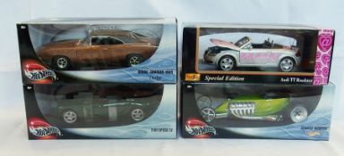 A 1/18 scale Maisto Audi TT Roadster, a Hotwheels TVR Speed 12, a Hotwheels slightly modified, and a