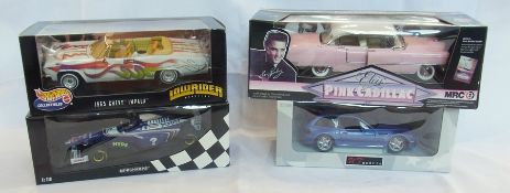 A Mini Champs Renault racing car, a Hotwheels Collectors 1965 Chevy Impala, a UT Model BMW Z3