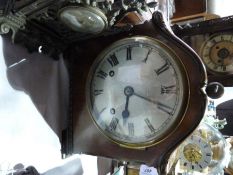 20th century mahogany mantel clock, inscribed "R. Rowell, Oxford", having scroll topped case,