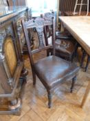 Set of six late Victorian carved walnut dining chairs, with carved foliate splats, upholstered