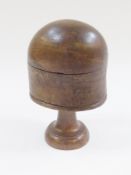 Victorian turned wood and rounded block wig stand, the base turned, tapered on circular foot, 29cm