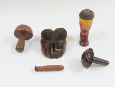 Hoof pincushion, amber glass darning support, two darning mushrooms and turned wood needlecase  (5)