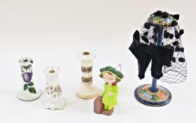 Wemyss style hatpin stand, plum decorated and two other ceramic hatpin stands, with young girl