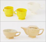 Gurmans modern teapot and matching cup together with two yellow studio pottery mugs and another (5)