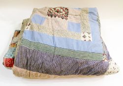 A large early 19th century English patchwork quilt reversible, patches on one side, squares on the