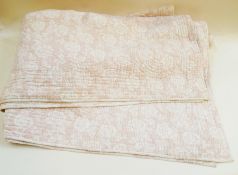 Pink and white quilted bedspread from the White Company