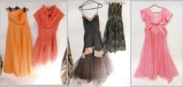 Various 1950's/60's/ vintage evening dresses including:- pink net and satin prom dress, yellow nylon