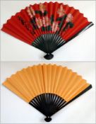 Two Chinese paper and wood fans, and small oriental gilt wood and painted fan, bird and floral
