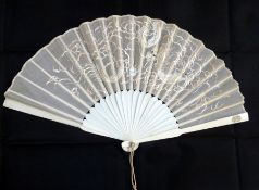 Oriental carved bone and embroidered fan with lacquered box, the fan with floral engraved guard