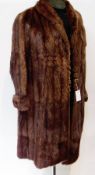 Three vintage fur coats