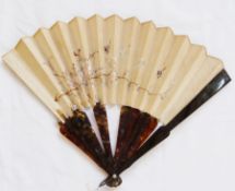 Oriental tortoiseshell and embroidered fan, the silk leaf embroidered with birds, flowering