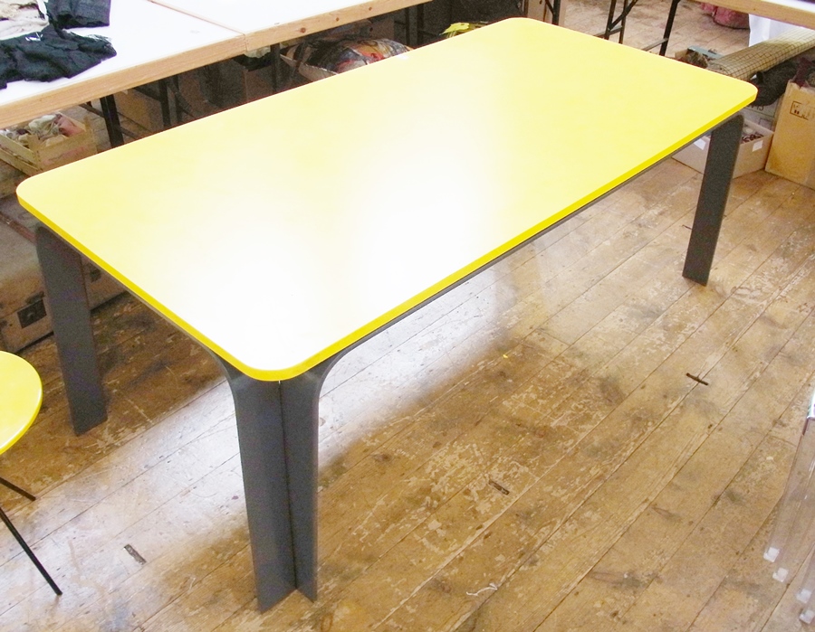 Modern designer, bright yellow dining table, by Nicholas Lowe, rectangular top to grey metal