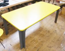 Modern designer, bright yellow dining table, by Nicholas Lowe, rectangular top to grey metal