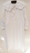Victorian style white long-sleeved cotton nightdress, Puritan style collar, pintucks and lace trim