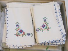 A large quantity table linen, embroidered tablecloths with matching embroidered napkins (1 box)