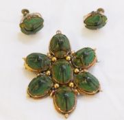 Gold coloured metal and green scarab beetle brooch, set with 7 scarabs and pair of matching screw