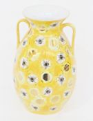 20th century two-handled yellow baluster shaped vase, decorated with bees, marked "Inese Brants"