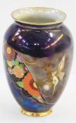 A Carlton Ware lustre vase, decorated in the Fairy design, lustre ground decorated with fairy and