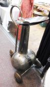 20th century metal giant carafe on wheels with handle, 70cm high