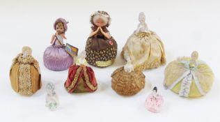 Seven continental porcelain half-dolls, mainly with bases, another with celluloid half doll with