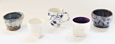 Two Solomia white glazed mugs, two studio pottery bowls and a white Inese Brants blue floral mug (5)