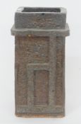 Studio pottery stoneware vase, of square form with relief decoration in grey glaze, 32cm high