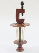 19th century wooden thread winder, possibly maple with turned cup to top, six supports, the clamp