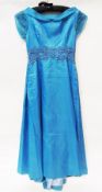 A blue chiffon and satin evening dress, with applique flowers around the empire waist, the centres