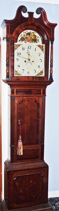Early nineteenth century inlaid mahogany longcase clock, the hood with moulded swan neck pediment,