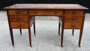 Edwardian inlaid mahogany kneehole desk, with tooled leather inset top, having an arrangement of