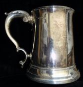 George III plain silver quart mug, with S-scroll handle, London 1775, maker J.S, 19oz approx