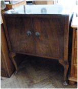 Modern walnut record cabinet with pair drawers on cabriole legs, 60cm wide