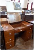 Modern dressing table with rectangular mirror, single frieze drawer to three small drawers on either