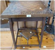 20th century inlaid games table, with under-tier and a circular two-tier stand with sprially twist