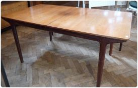 1970's rosewood extending dining table, on circular straights supports, 167cm unextended
