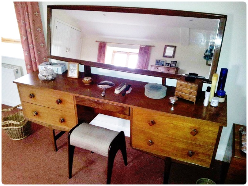 1960s G-plan style teak dressing table, with long mirror, central kneehole drawer flanked by two